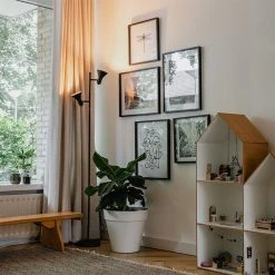 QAZQA Moderne Stehleuchte schwarz mit 2 goldenen Lichtern - Magno