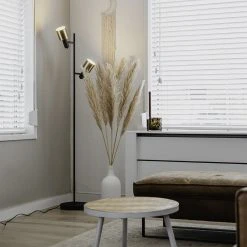 QAZQA Design-Stehlampe schwarz mit goldenen 2-Lichtern - Stijn